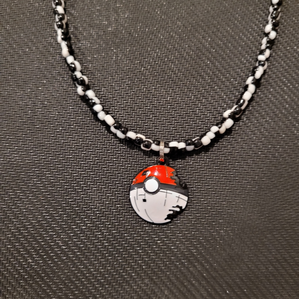 Red And Black Beaded Necklace With Pok Ball Pendant 15$